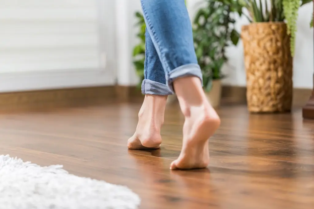 bare feet walking on a heated living room floor